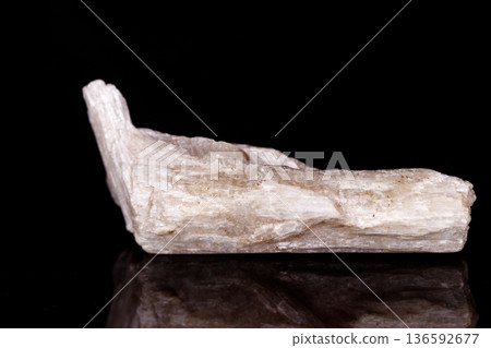 Macro mineral stone Orthoclase on black background Macro mineral stone Orthoclase on black background 136592677