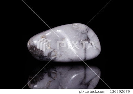 Macro mineral stone Magnesite on black background Macro mineral stone Magnesite on black background 136592679