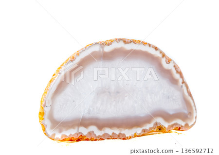 Macro mineral orange agate in crystals on white background Macro mineral orange agate in crystals on white background 136592712