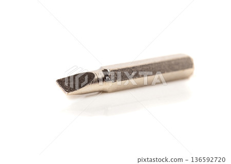 A set of different attachments for a head screwdriver with a screwdriver on a white background A set of different attachments for a head screwdriver with a screwdriver on a white background 136592720