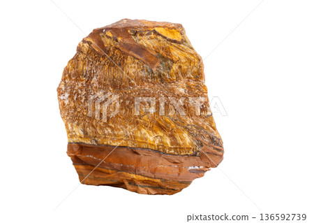 Macro mineral stone Tiger's eye in the breed on a white background Macro mineral stone Tiger's eye in the breed on a white background 136592739
