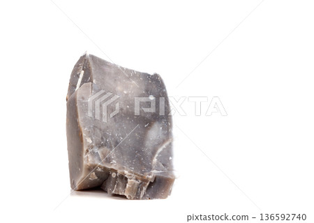 Macro mineral stone Flint in the rock on a white background 136592740