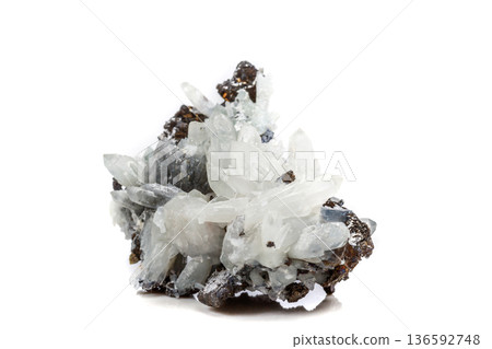 Macro mineral stone Drusus quartz with sphalerite in the rock a white background Macro mineral stone Drusus quartz with sphalerite in the rock a white background 136592748