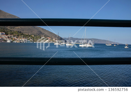 AGIA EFIMIA PORT, KEFALONIA ISLAND - JULY 27, 2025: Picturesque view of Agia Efimia marina, Kefalonia island, Ionian Sea, Greece. 136592756