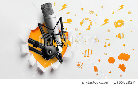 Podcast microphone breaks through wall with sound icons and symbols flying around it Podcast microphone breaks through wall with sound icons and symbols flying around it 136592827