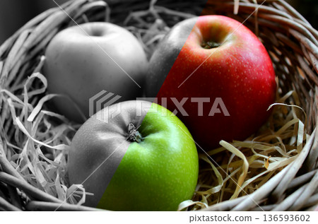Half Image of Variety Color Apples in Wicker Pot, Another Half is Grayscale. Conceptual Photo on the Theme of Fruit Chemical Treatment Half Image of Variety Color Apples in Wicker Pot, Another Half is Grayscale. Conceptual Photo on the Theme of Fruit Chemical Treatment 136593602