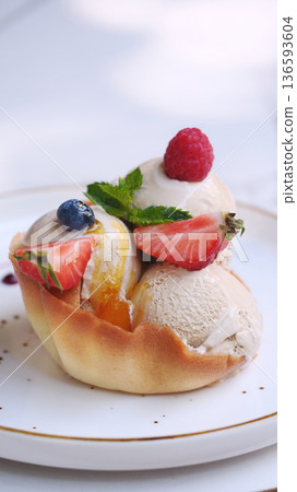 Homemade strawberry vanilla ice cream with fresh strawberries. Sweet berry summer dessert. Homemade strawberry vanilla ice cream with fresh strawberries. Sweet berry summer dessert. 136593604