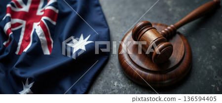 Wooden judge gavel on Australian flag background for legal concepts 136594405