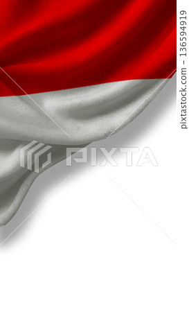 Symbol of sovereignty, Indias national flag billows in the wind against a clear sky 136594919