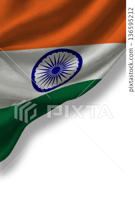 Symbol of sovereignty, Indias national flag billows in the wind against a clear sky 136595212