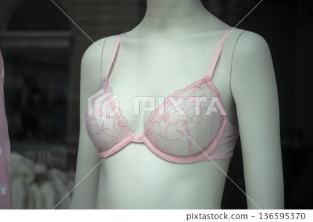 closeup of pink bra on mannequin in fashion store showroom for women 136595370