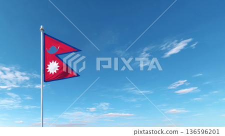 National flag of Nepal waving against a clear blue sky on a sunny day 136596201