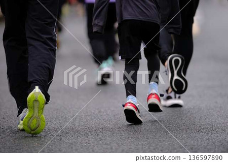 City marathon marathon runner running downhill 136597890