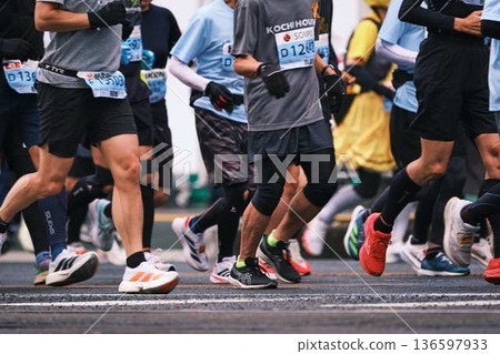 City marathon marathon runner running downhill City marathon marathon runner running downhill 136597933