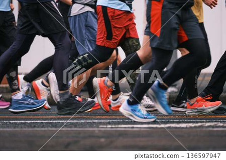 City marathon marathon runner running downhill City marathon marathon runner running downhill 136597947