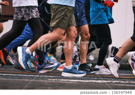 City marathon marathon runner running downhill City marathon marathon runner running downhill 136597949