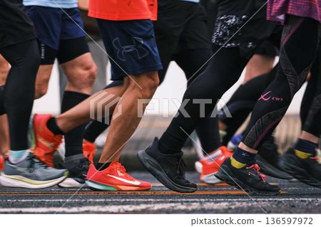 City marathon marathon runner running downhill City marathon marathon runner running downhill 136597972
