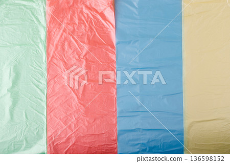 Colorful plastic bags creating an abstract textured background Colorful plastic bags creating an abstract textured background 136598152