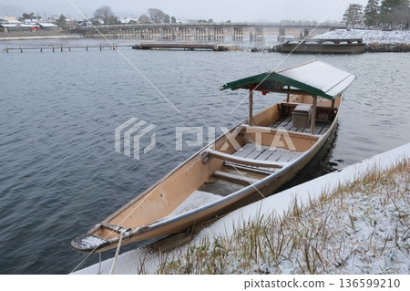 Togetsukyo Bridge and houseboats in winter Togetsukyo Bridge and houseboats in winter 136599210