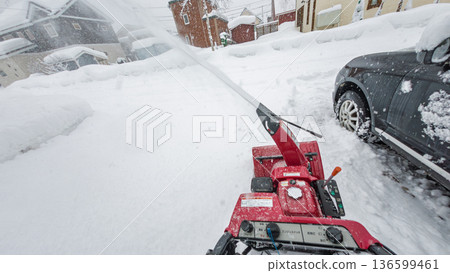 Subjective video (POV) of using a snowblower Subjective video (POV) of using a snowblower 136599461