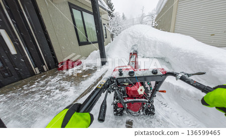 Subjective video (POV) of using a snowblower Subjective video (POV) of using a snowblower 136599465