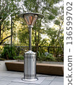 Outdoor electric heater installed outdoors 136599702
