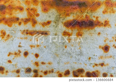 Close-up of rust patterns on weathered metal surface Close-up of rust patterns on weathered metal surface 136600884