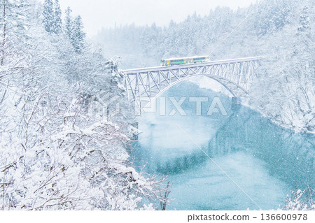 Snow scene on the Tadami Line's First Tadami River Bridge 136600978