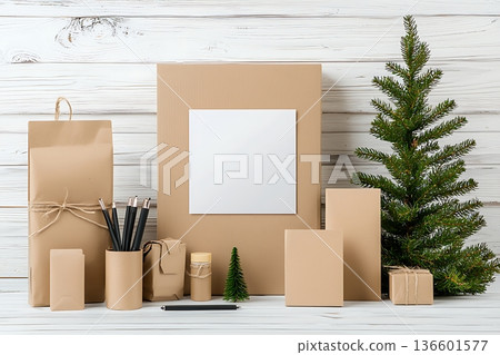 Minimalist Christmas Decor with Brown Packaging and Greenery on Wooden Background 136601577