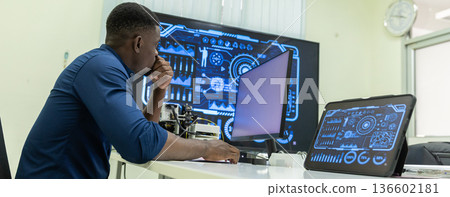 Black Researcher Making a Quantum Computing Experiment, 136602181