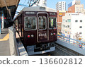 A train bound for Tsukaguchi stops at Hankyu Itami Station 136602812