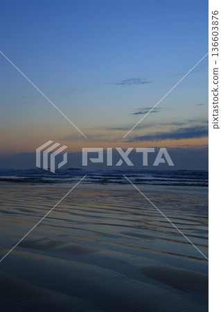 beautiful beach sunrise 136603876