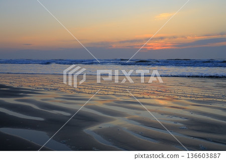 beautiful beach sunrise 136603887