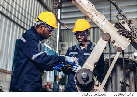 Workers Factory or Engineering work at factory site check up machine or products in site. Workers Factory or Engineering work at factory site check up machine or products in site. 136604148