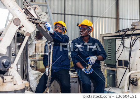 Workers Factory or Engineering work at factory site check up machine or products in site. Workers Factory or Engineering work at factory site check up machine or products in site. 136604151