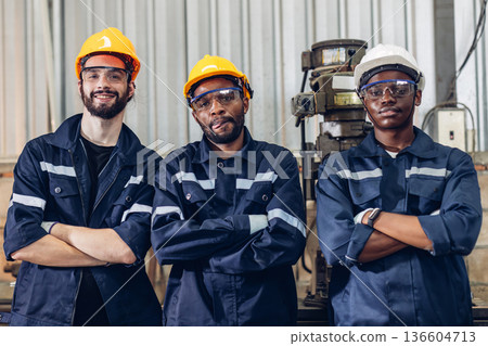 Team Workers Factory or Team Engineering work at factory site check up machine or products in site. Team Workers Factory or Team Engineering work at factory site check up machine or products in site. 136604713