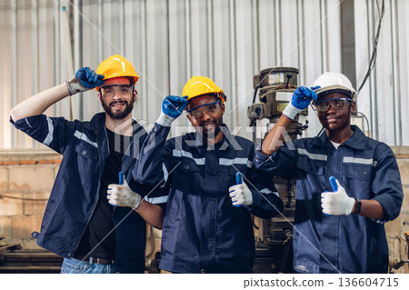 Team Workers Factory or Team Engineering work at factory site check up machine or products in site.  136604715