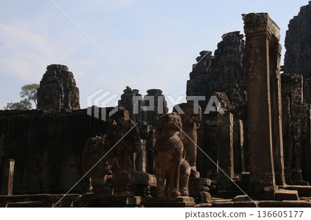 Naga and Singha, headless Buddha statues Naga and Singha, headless Buddha statues 136605177