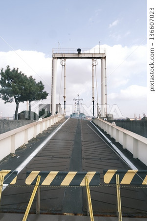 Industrial landscape with a view of the dock's lift bridge and ships Industrial landscape with a view of the dock's lift bridge and ships 136607023