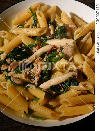 Penne pasta with tuna, spinach and mushrooms Penne pasta with tuna, spinach and mushrooms 136607156