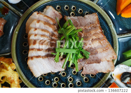 Traditional Korean Boiled Pork Belly Slices Bossam with Chives Garnish Traditional Korean Boiled Pork Belly Slices Bossam with Chives Garnish 136607222