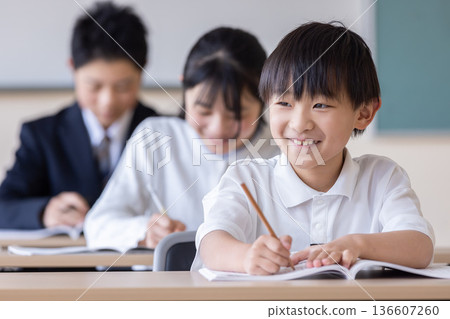 Children learning with smiles Children learning with smiles 136607260