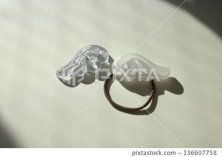 Resin angel wings basking in the sunlight by the window 136607758