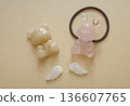 Warm-colored bear and rabbit resin figures 136607765
