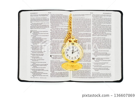 Open Holy Bible With Golden Pocket Watch In The Center Open Holy Bible With Golden Pocket Watch In The Center 136607869