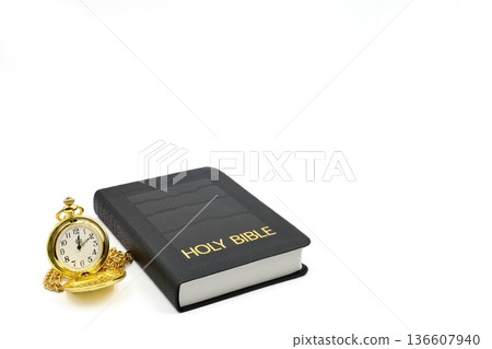 Black Leather Holy Bible With Golden Pocket Watch Next To It White Background 136607940
