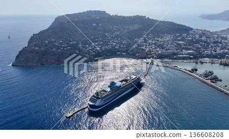 Cruise ship docks in resort town. picturesque seaport Cruise ship docks in resort town. picturesque seaport 136608208
