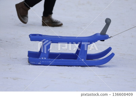 Blue plastic sled. High quality photo Blue plastic sled. High quality photo 136608409
