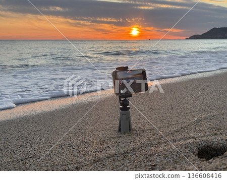 Shooting on the beach at sunset. High quality photo 136608416