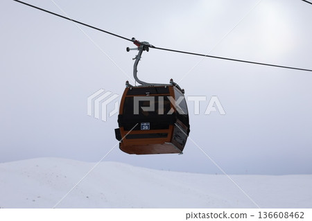 Snowy mountain cablecar. Cable car in a snowy mountain, winter resort High quality 4k footage 136608462